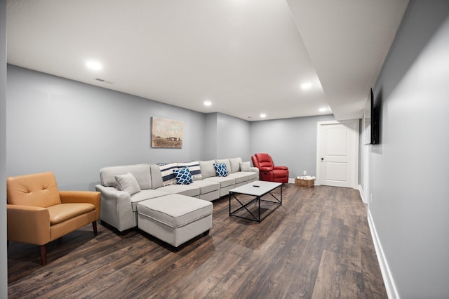 living room featuring dark wood-type flooring