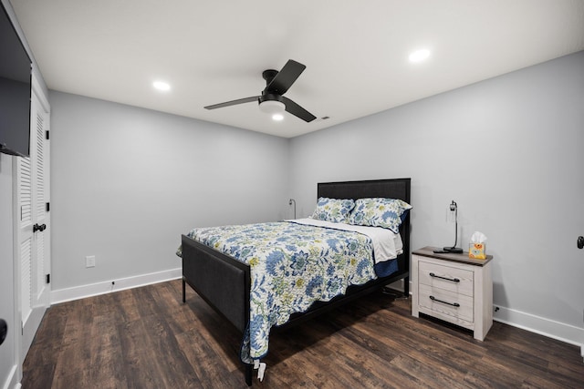 bedroom featuring ceiling fan and dark wood-type flooring