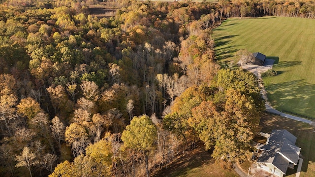 birds eye view of property with a rural view