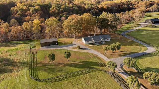 birds eye view of property with a rural view