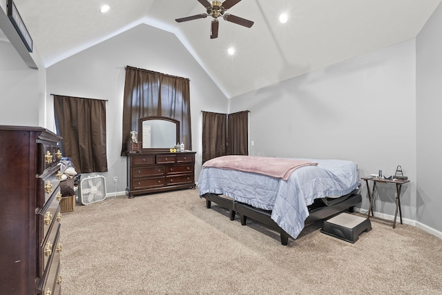 bedroom with ceiling fan, high vaulted ceiling, and light colored carpet