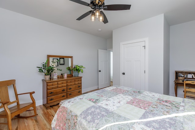 bedroom featuring light wood-type flooring and ceiling fan