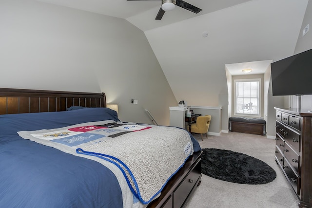 carpeted bedroom featuring lofted ceiling and ceiling fan