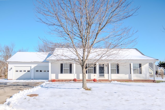 ranch-style house featuring a garage