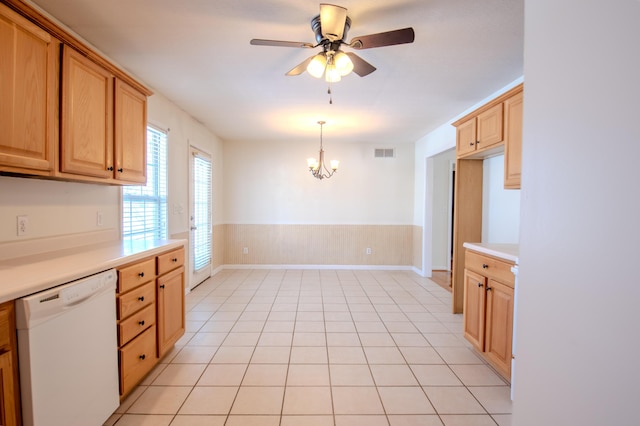 kitchen with hanging light fixtures, light tile patterned floors, ceiling fan with notable chandelier, and white dishwasher