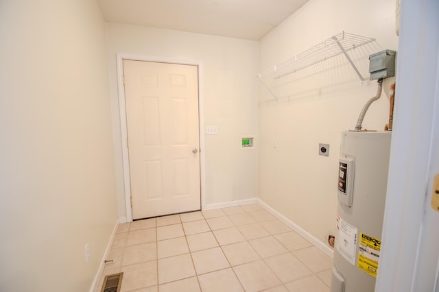 washroom featuring electric water heater, light tile patterned floors, hookup for an electric dryer, and hookup for a washing machine