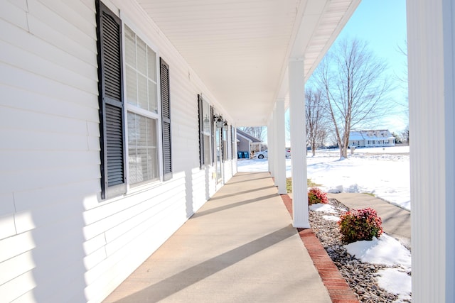 view of snow covered patio