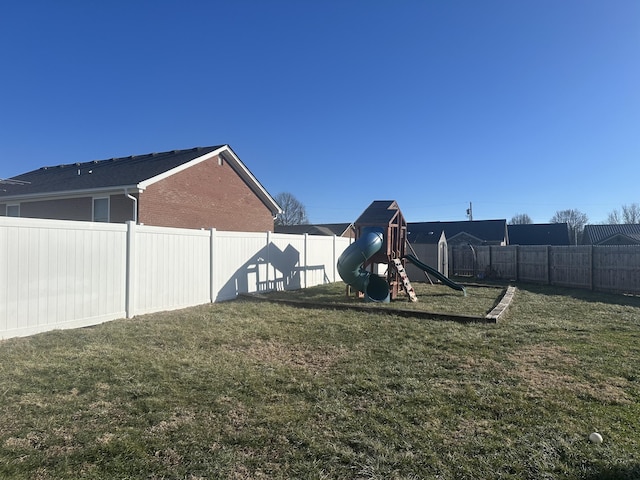 view of yard with a playground