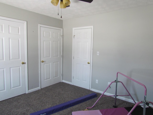 unfurnished bedroom with carpet floors and ceiling fan