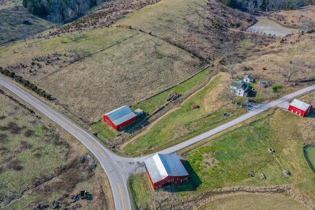 bird's eye view featuring a water view and a rural view