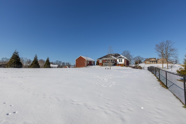 view of yard covered in snow