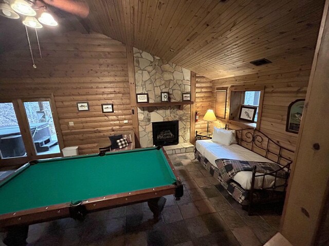 bathroom with an enclosed shower, wood ceiling, vanity, wooden walls, and toilet