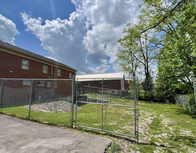 240 E Main St, Mount Vernon, KY 40456 - view of gate with fence and a yard