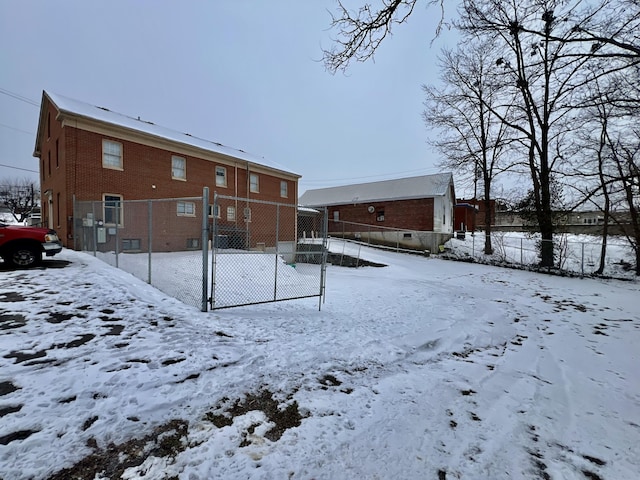 view of snow covered house