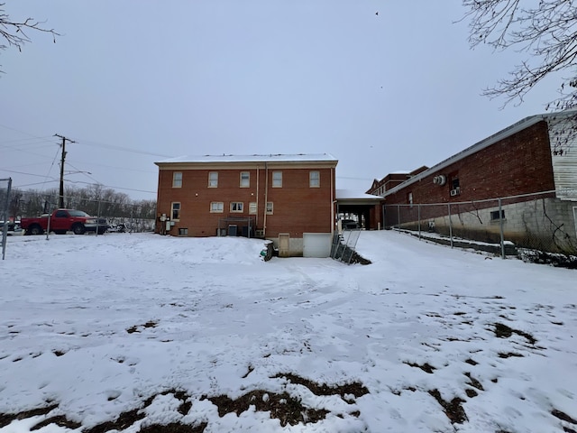 view of snow covered house