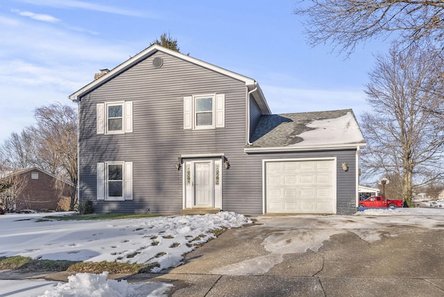 view of front of home with a garage