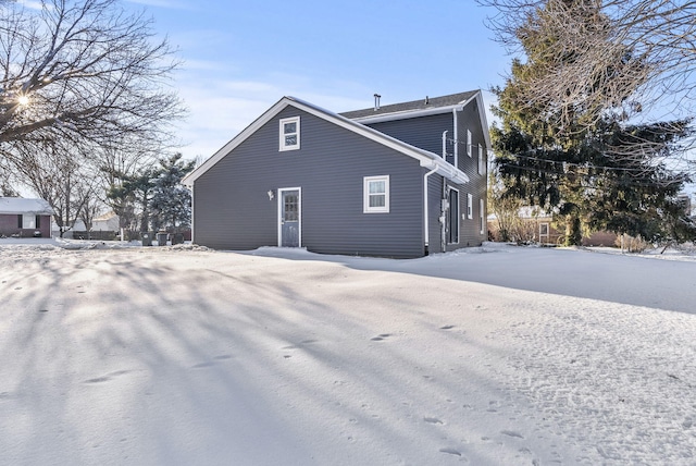 view of snow covered house