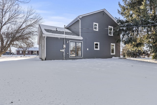 view of snow covered property