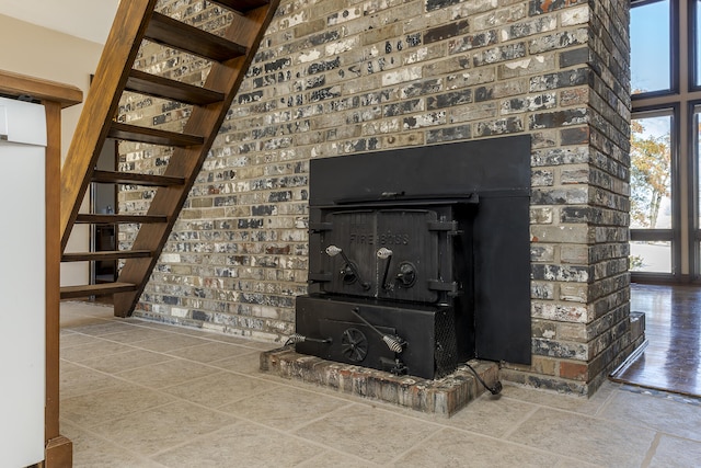 interior details featuring a wood stove