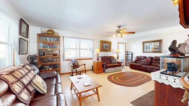 living room featuring ceiling fan