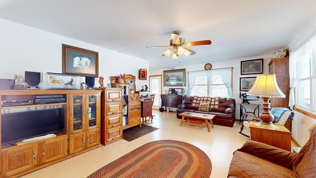 living room featuring ceiling fan