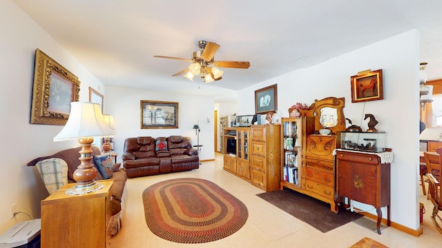 living room with ceiling fan