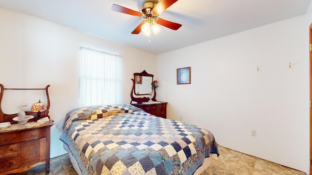 bedroom featuring ceiling fan