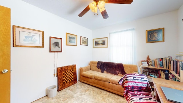 living room with ceiling fan