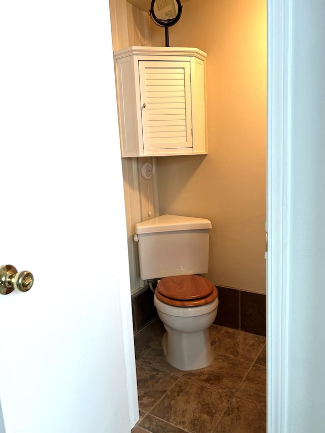 bathroom featuring toilet