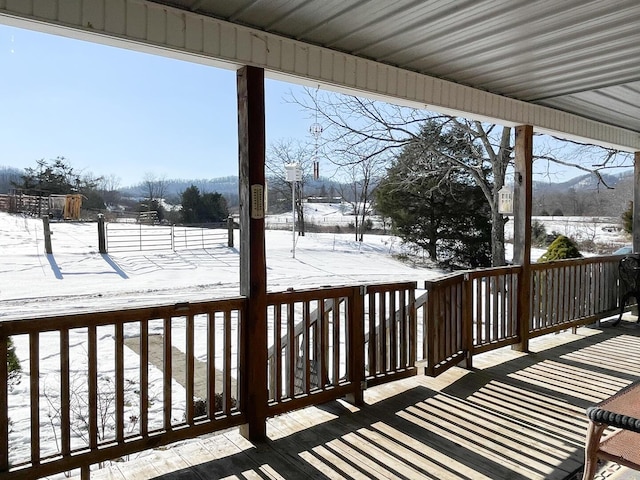 view of snow covered deck