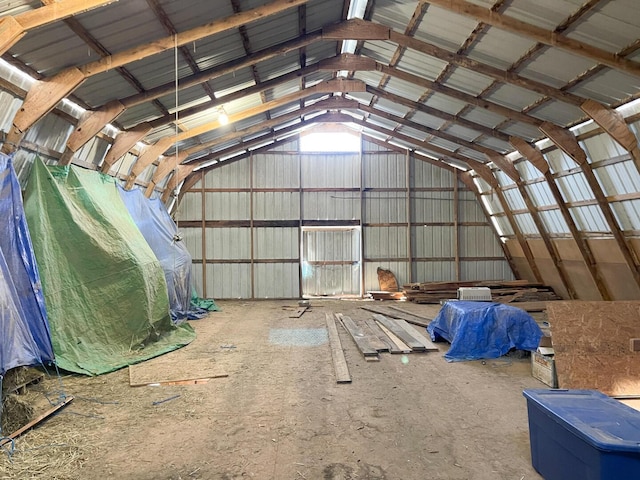 interior space featuring vaulted ceiling