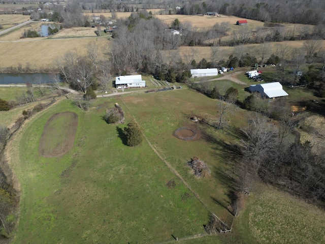 bird's eye view featuring a water view and a rural view