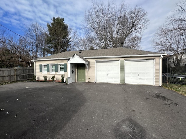 ranch-style house featuring a garage