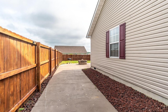 view of side of home featuring a patio