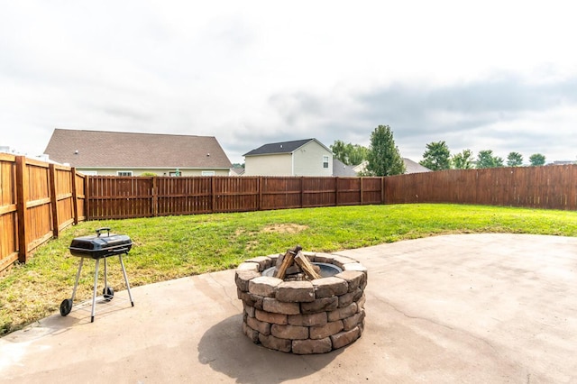 view of patio / terrace with a fire pit