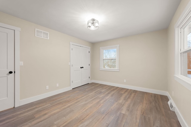 unfurnished bedroom featuring light hardwood / wood-style flooring