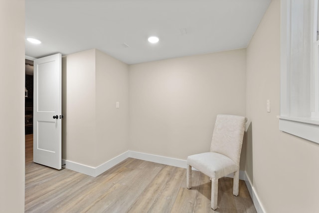 sitting room with light hardwood / wood-style floors