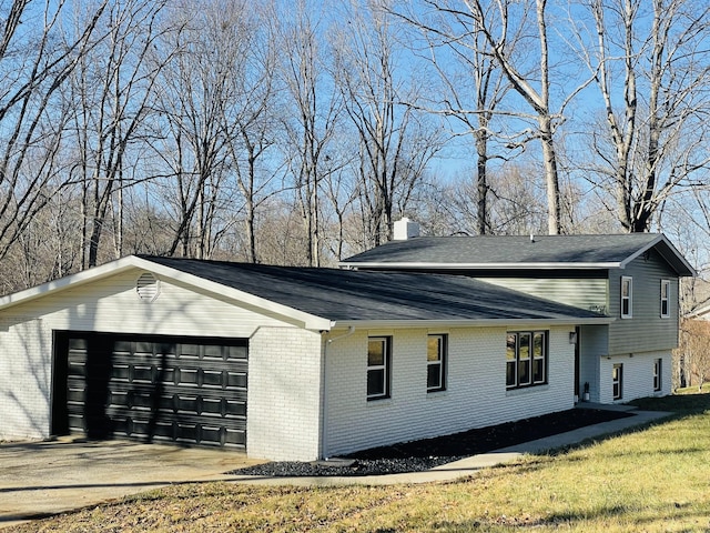 view of side of home with a garage