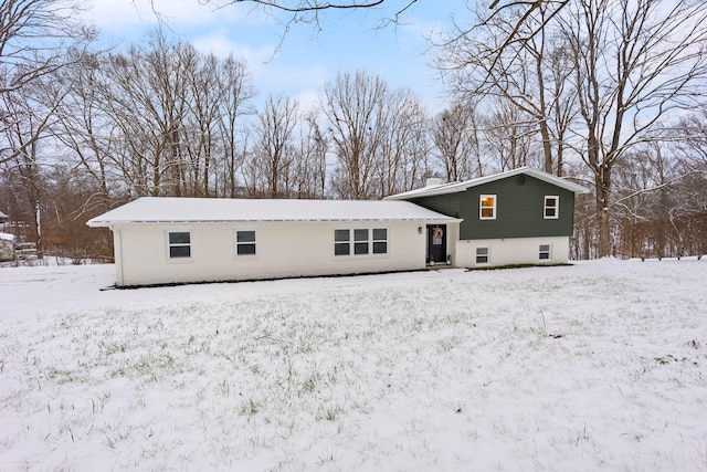 view of snow covered property