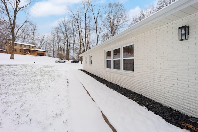 view of snow covered property