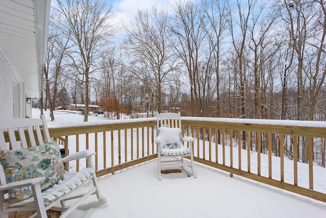 view of snow covered deck