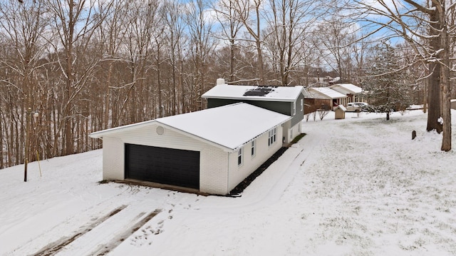 exterior space with a garage