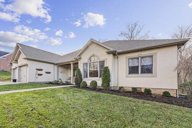 ranch-style house with a front yard and a garage