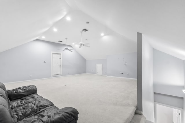 bonus room with ceiling fan, light carpet, and lofted ceiling