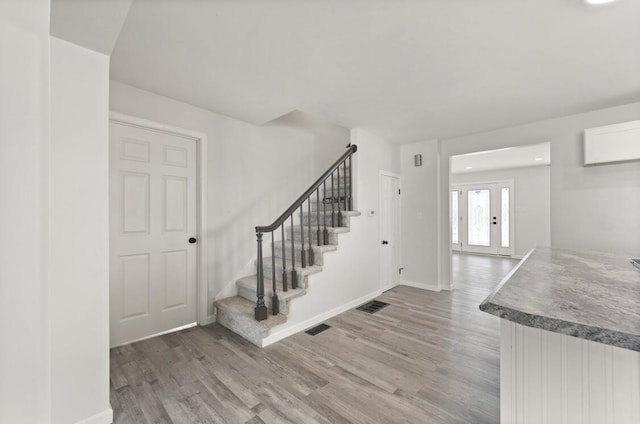 foyer featuring hardwood / wood-style flooring