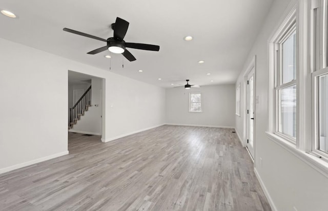 unfurnished living room featuring light hardwood / wood-style flooring