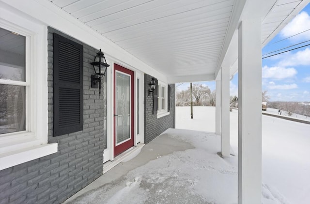 view of snow covered patio