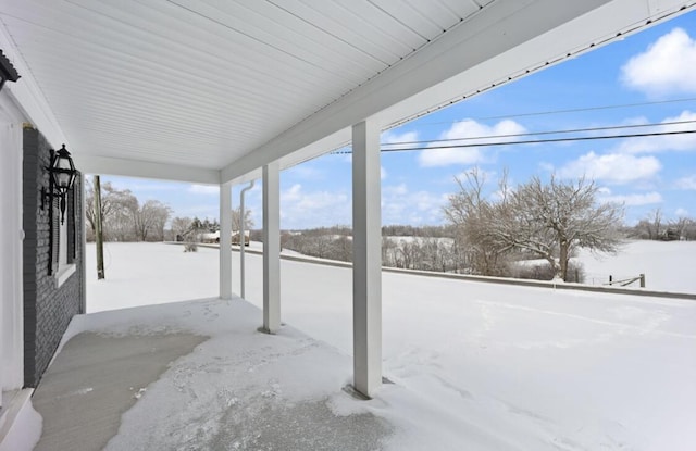 view of snow covered patio