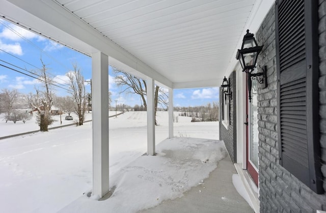 view of snow covered patio