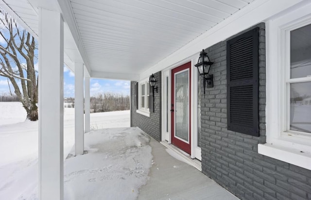 view of snow covered patio